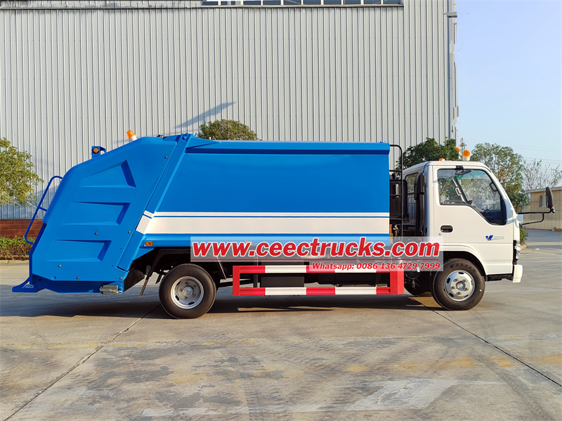 Isuzu NKR trash compactor truck