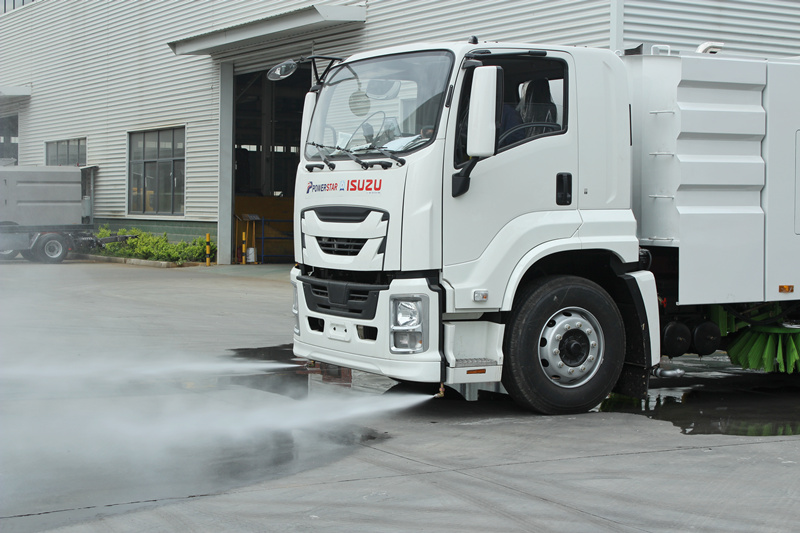 Front flushing for road cleaning and dust suppression